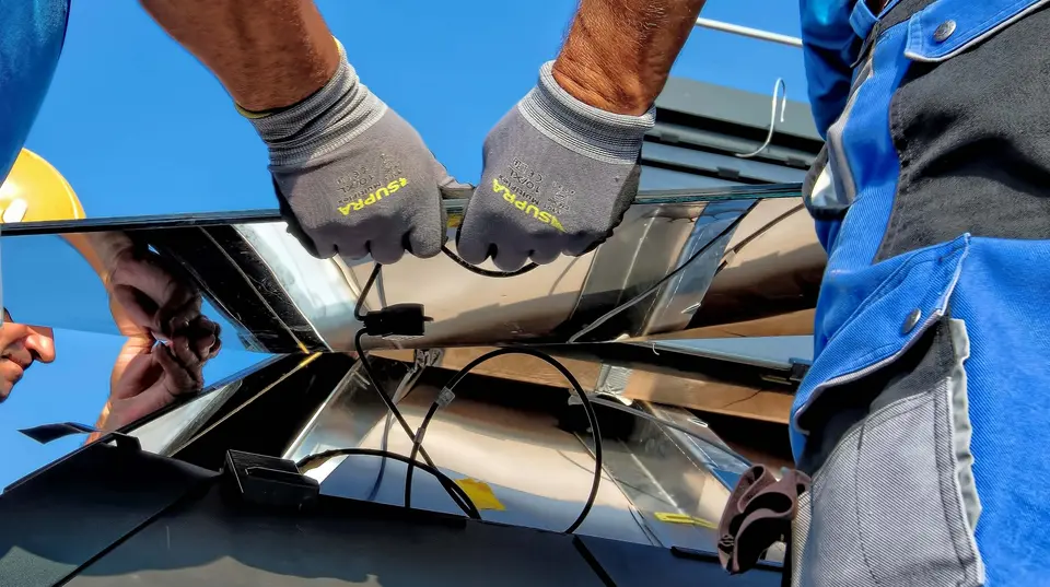 Installer wiring a photovoltaic module